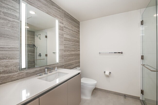 Building Photo - Urban Oasis at Spire Condominiums – Modern...