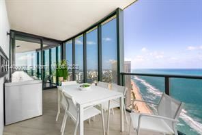 Building Photo - 4 br, 4.5 bath Condo - 18555 Collins Ave A...