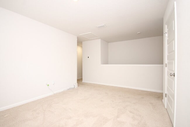 Building Photo - Spacious 5-Bedroom Home Near NAS with Move...