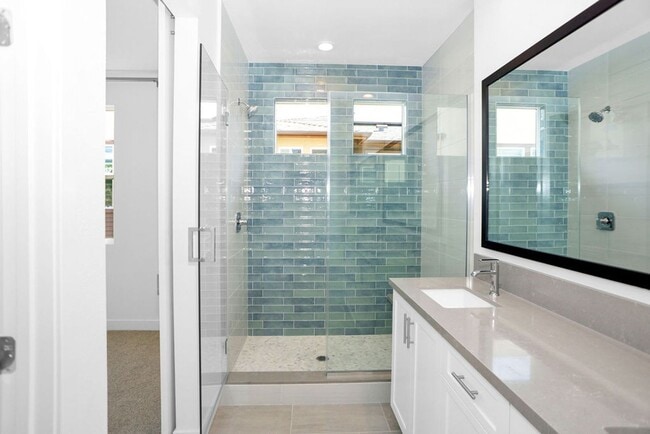 Building Photo - Gorgeous brand new townhome in 3Roots! End...