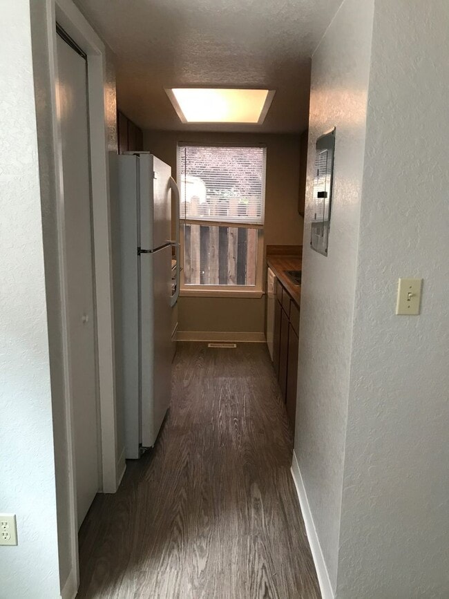 Building Photo - Updated 2 BR / 1.5 BA End Unit – Private Yard & Fresh Interior!