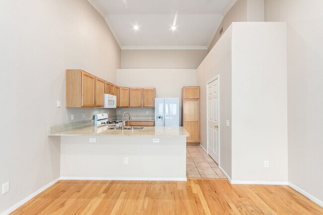 Building Photo - GATED SUMMERLIN CONDO/COMMUNITY POOL/SPA/ BASKETBALL COURT-2 CAR ATTACHED GARAGE!