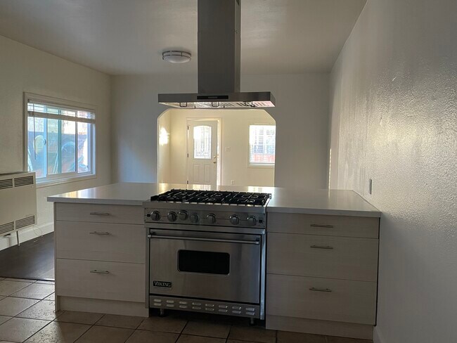 Chef's Kitchen with a grand island. Plenty of bar seating - 2031 Sheridan St