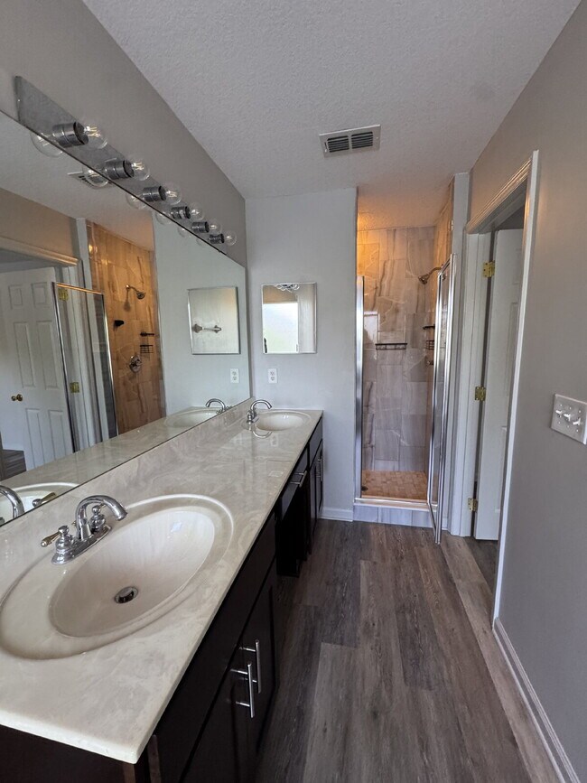 Building Photo - Spacious 4 Bedroom Pond-View Home with Upg...