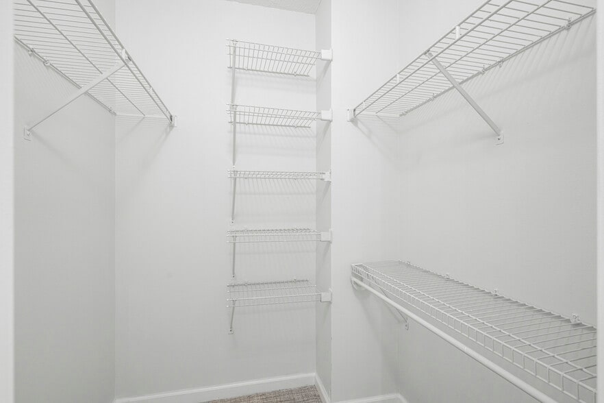 Get organized in 25 sq ft walk-in closet. - 4 Martine Ave