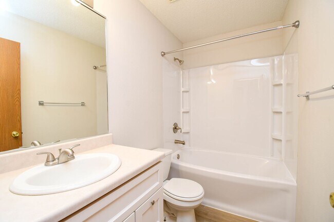 Building Photo - Updated 3BR Split-Level Home with Huge Deck, Fenced Yard & 2-Car Garage Near I-29!