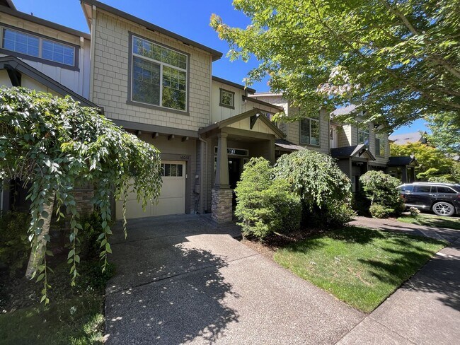 Building Photo - Beautifully Updated Bethany Townhome with Private Backyard and Modern Finishes