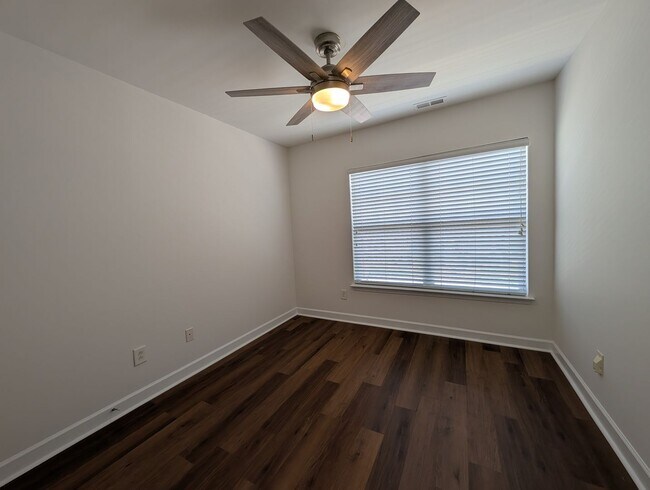 Building Photo - Pristine End Unit Townhome located in the Prosperity Place community!