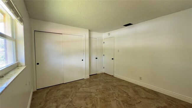 Building Photo - 6957 NW 9th Ct