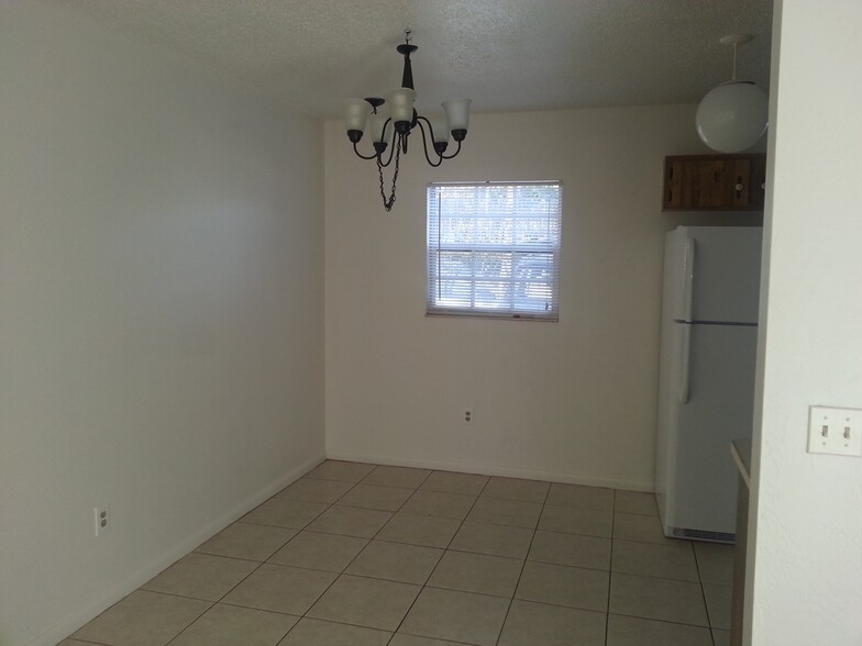 Dining Area right next to kitchen and open to Living Area - 13 Empress Ln