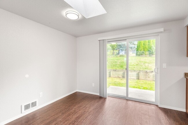 Building Photo - Recently updated 3 bdrm, 2 bath. Attached garage. Wrap around yard. Private upstairs bedroom and ...