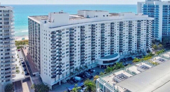 Building Photo - 6039 Collins Ave