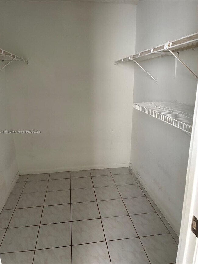 Building Photo - 4675 W 18th Ct