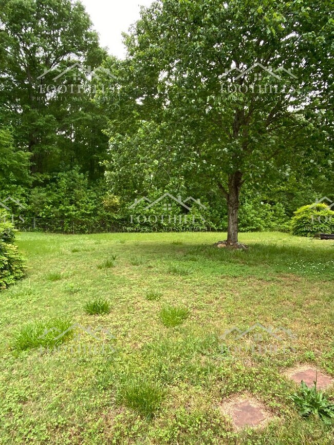 Building Photo - Beautiful 3-Bedroom Brick Home with Sunroo...