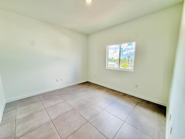 Building Photo - 1295 W 69th St