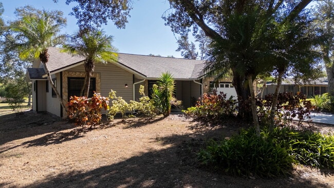 Building Photo - Country-Style Sarasota Living on a Full Acre - Pool Home with Oversized Workshop — Move-In Ready Now