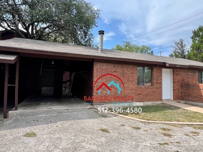 Building Photo - Available Now: 2 Bed Duplex with Carport a...