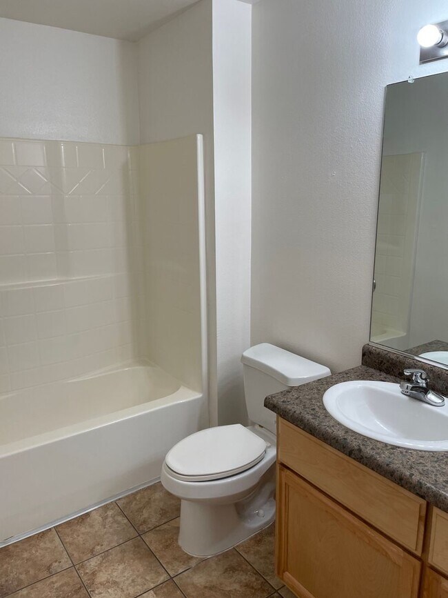 Building Photo - 3 Bedroom, 2 Bathroom House with a 2-Car Garage