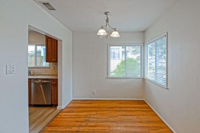 Building Photo - Bright & Charming, Single Story 3BR2BA Home w/ Large Front Yard, Huge Fenced Rear Yard w/ Large D...