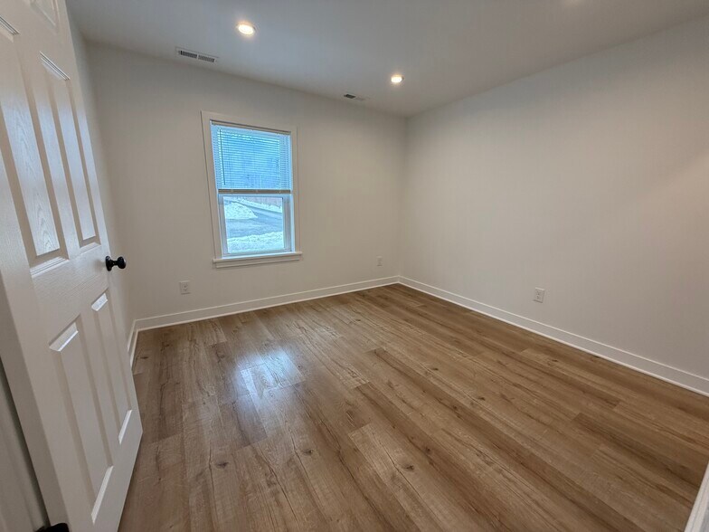 Bedroom - view from bathroom - 303 Wollerton St