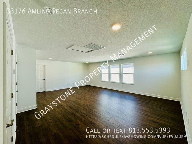 Building Photo - "Luxury Living in Wesley Chapel: Spacious ...