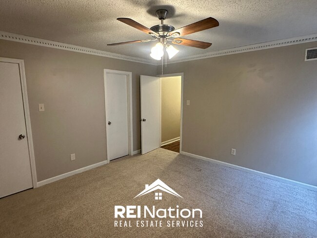 Building Photo - NEWLY RENOVATED! Massive 4BR/2BA Bartlett Stunner | Hardwoods & Fireplace!