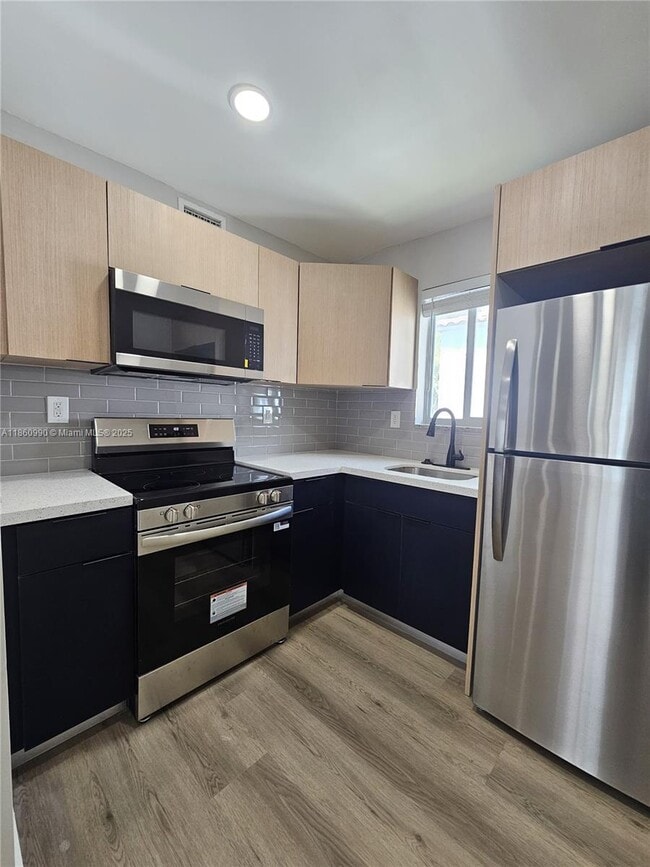 Building Photo - 560 NE 63rd St
