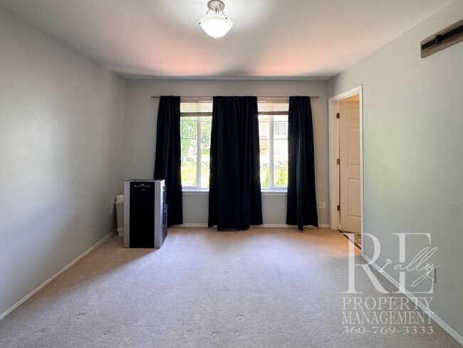 Building Photo - Dual Primary Suites, Huge Backyard Deck & Sun-Filled Living Spaces Near Everyday Conveniences