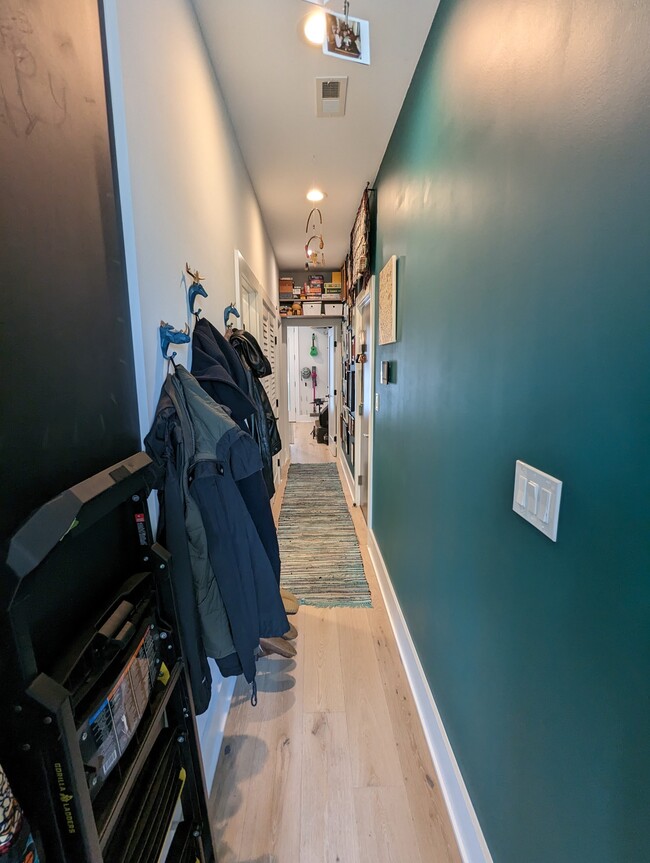 Hallway with coat rack and shoe rack - 459 Florida Ave NW