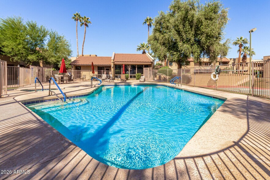 Sparkling resort-style pool. - 5877 N Granite Reef Rd