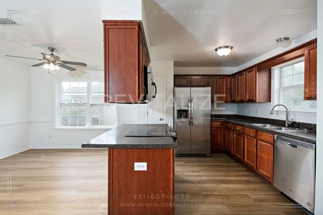 Building Photo - Spacious 3-Bedroom Home with Open Floor Plan and Big Backyard in West Mobile!