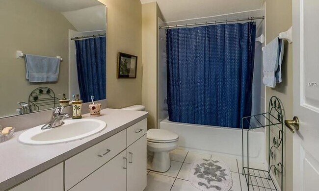 Building Photo - Charming 4-Bedroom Home with Pond Views & ...