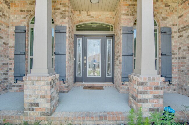 Building Photo - Milton 4BR Pool Home with Office, Vaulted Ceilings, Screened Saltwater Pool & 2-Car Garage