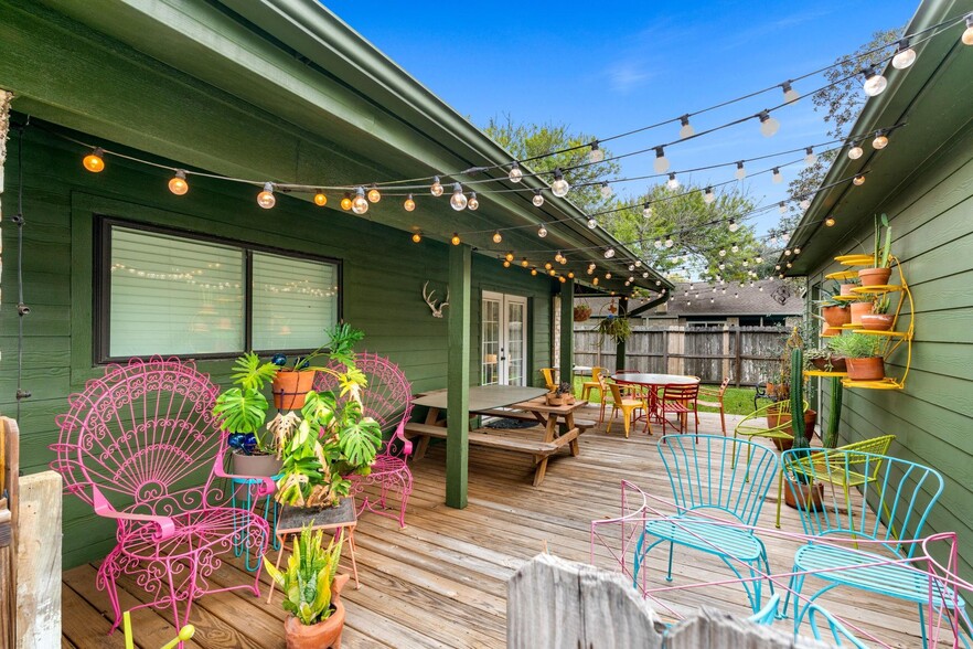 Huge patio w/ french doors to the master bedroom and bistro lights - 1178 Bournewood Dr