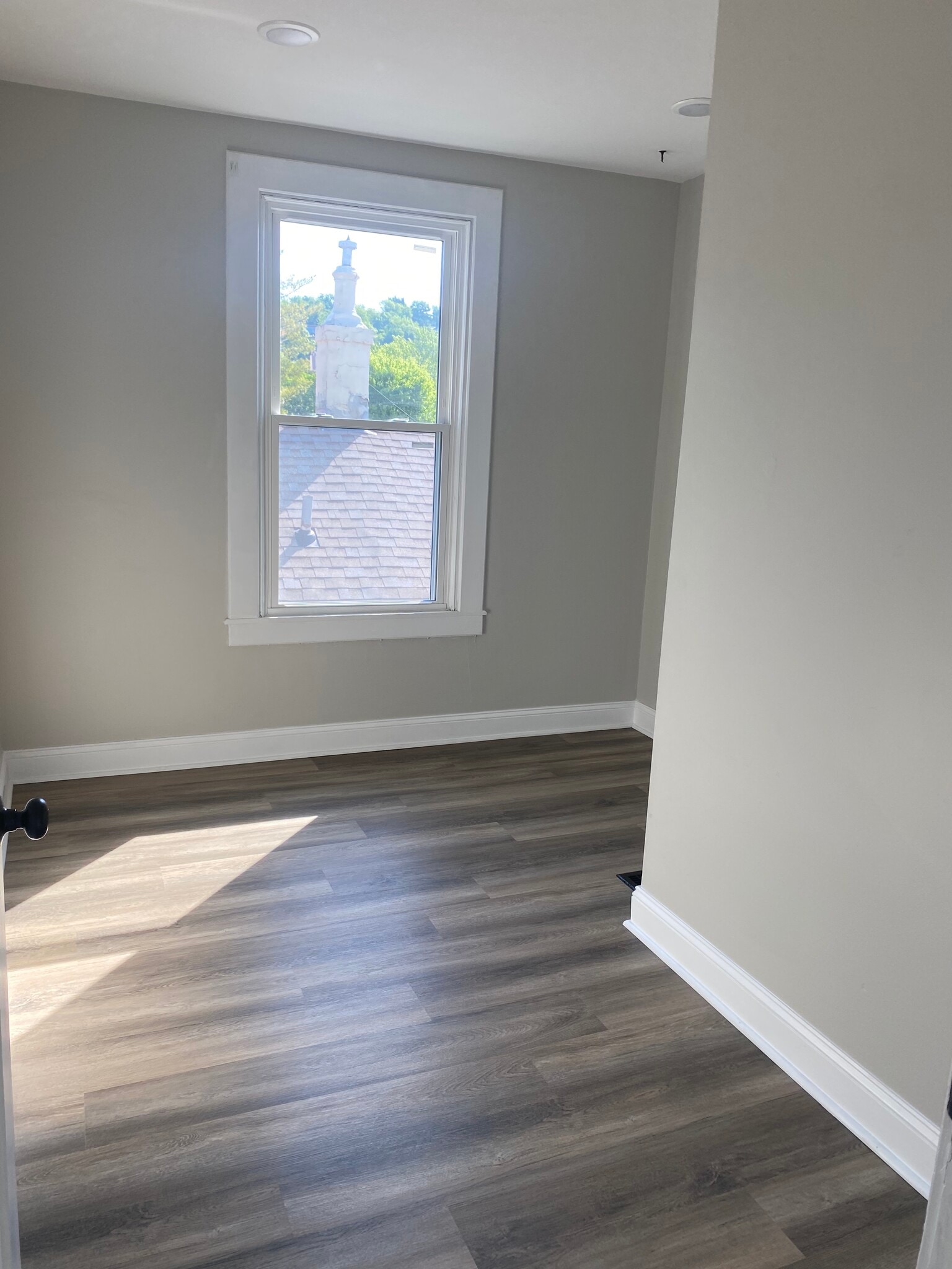 Bedroom 3 features Luxury Vinyl Tile Flooring - 308 Center St