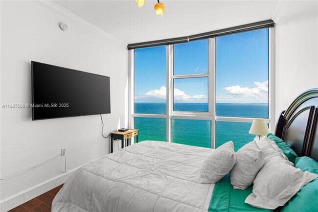 Building Photo - 18201 Collins Ave