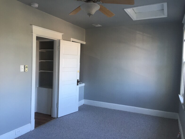 Front bedroom with storage space and lots of light. - 1110 4th St NE