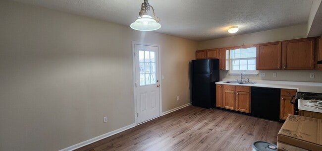 Building Photo - Fantastic 3 Bedrooms & 1.5 Bathroom, Two Story with a Garage!  Freshened Paint throughout!  Newer...