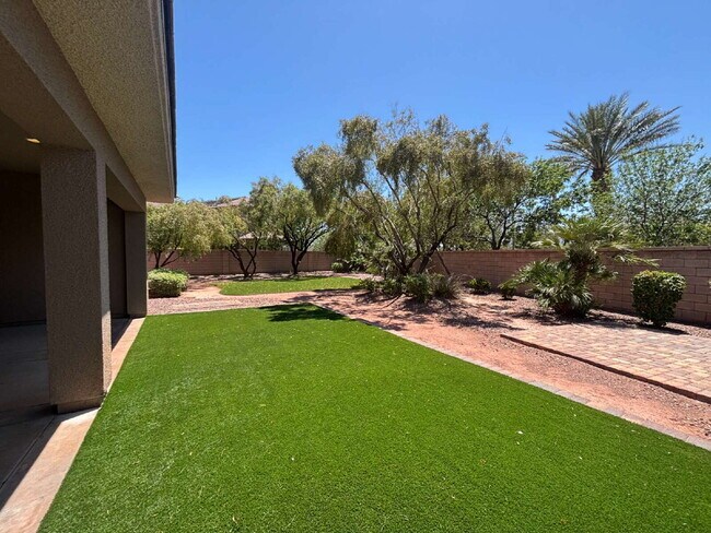 Building Photo - 5-Bed Retreat with Granite Elegance & Cozy Fireplace – 3690 Sq Ft of Comfort in Las Vegas with a ...