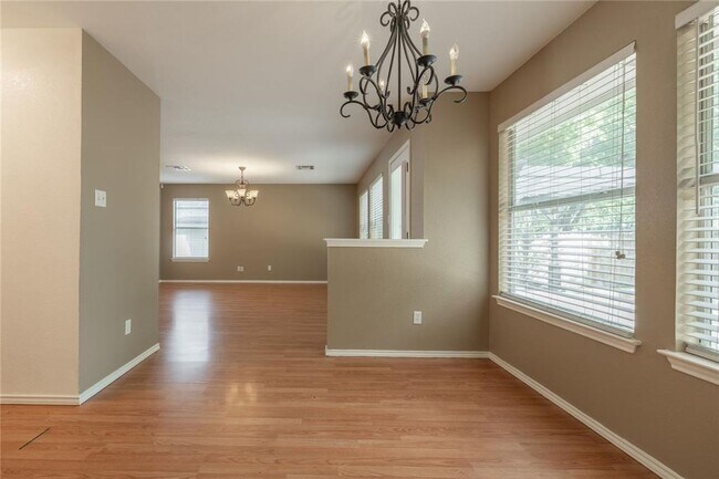 Building Photo - No Carpet! Tons of Space! Beautiful backya...