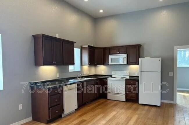 Building Photo - 7038 W Blanchard Rd