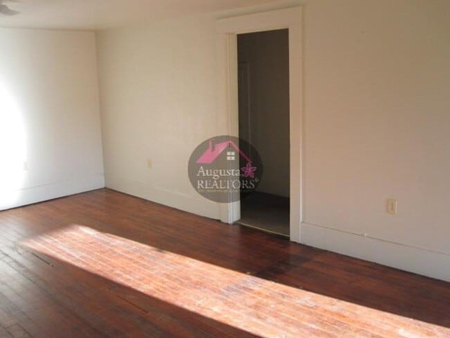 Building Photo - Three