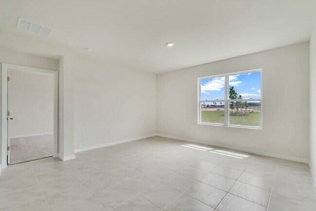Building Photo - 4 bedrooms and 2 bathrooms, the spacious 1,828 sq ft home features an open concept with a 2 car g...