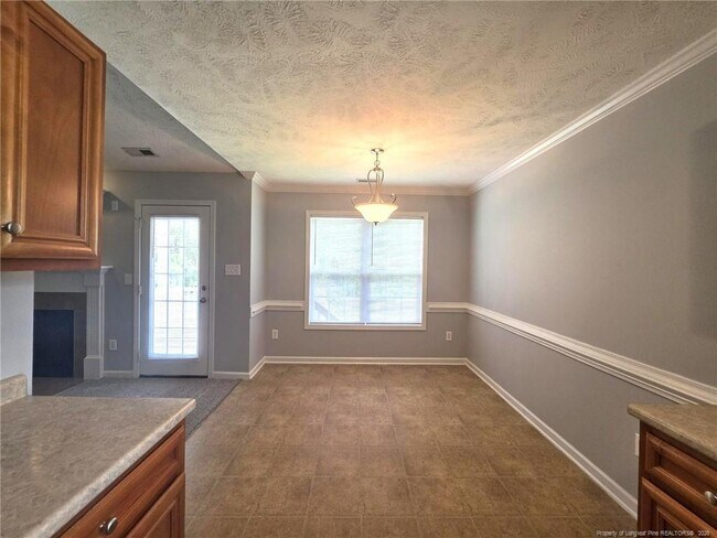 Building Photo - 6312 Firefly St