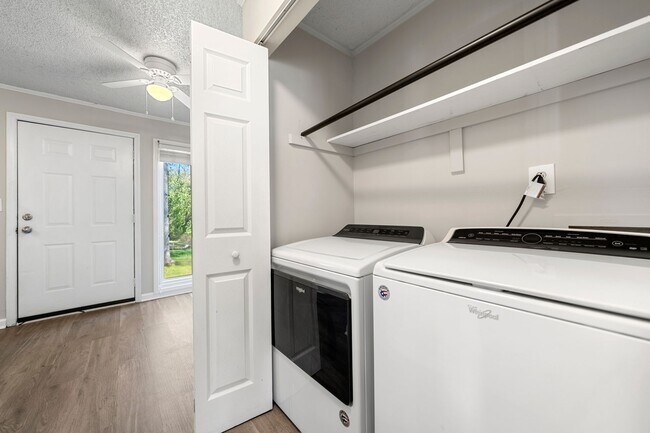 Building Photo - Introducing a Charming End Unit Townhouse ...