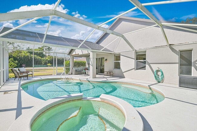 Building Photo - AVAILABLE May 1 - Single Family Pool Home in the Heart of Three Oaks