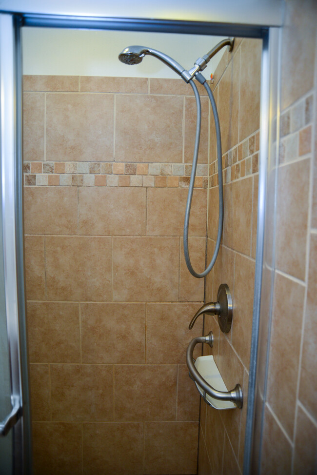 Main floor shower. - 1060 21st Ave SE