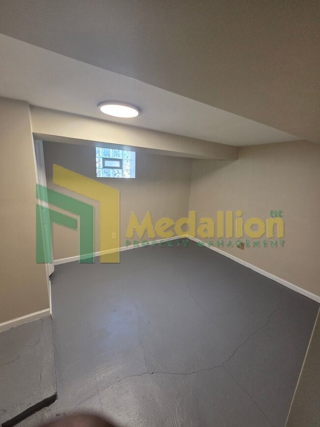 Building Photo - Spacious 4-Bedroom Home with Finished Basement and Yard Space