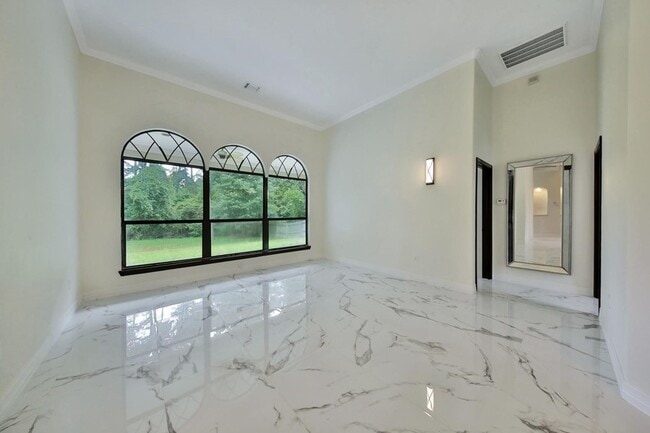 Building Photo - Beautiful Mediterranean Home In Gated Comm...