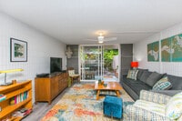 Building Photo - GROUND FLOOR FURNISHED 1/1 CONDO, 1 parking Avail 01.28.26